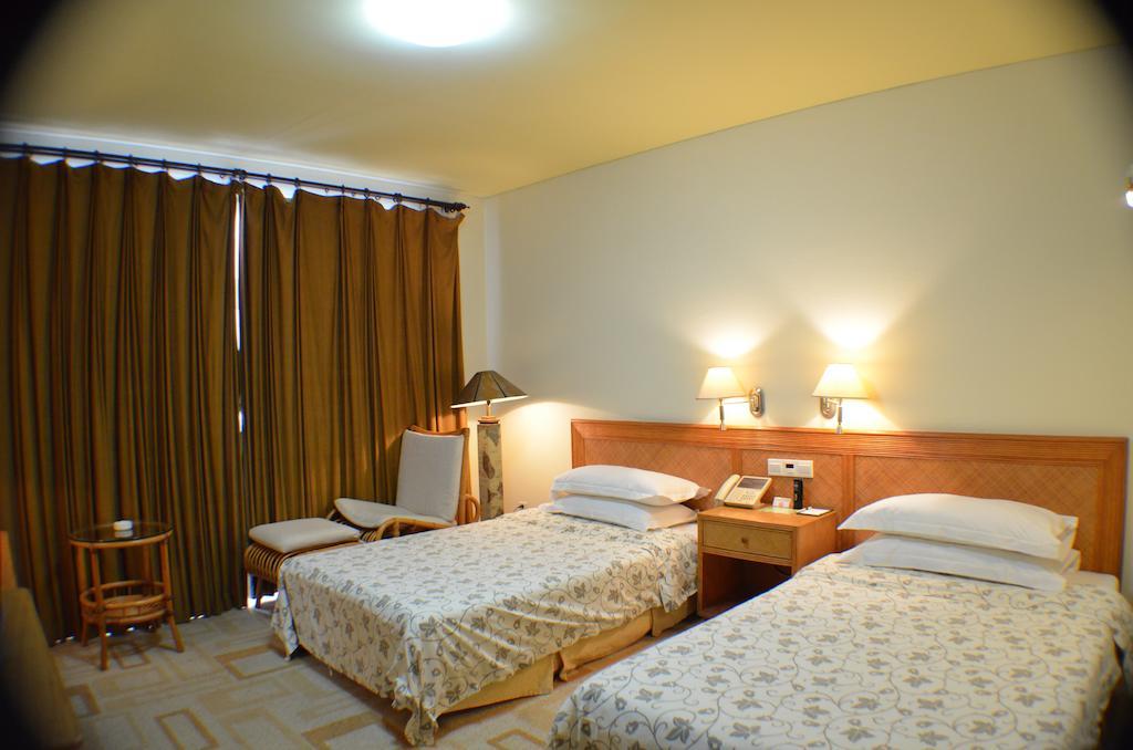 Rghcm Garden Resorts Pequim Quarto foto